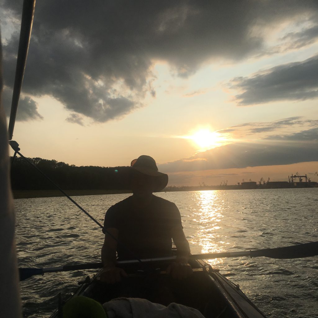 Cristian sails at sunset